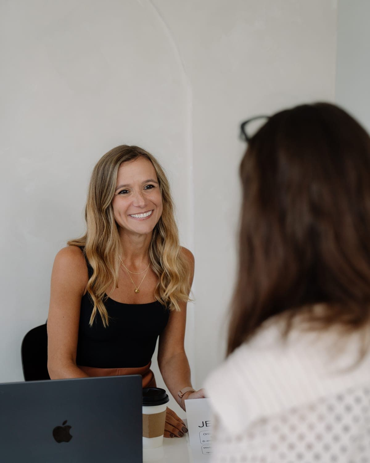 Emma at Fiddle Leaf Marketing working with a client